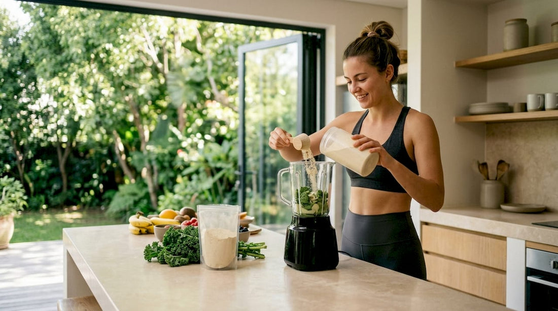 Woman preparing plant protein smoothie in kitchen
