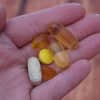 Floating capsules from the collection of vegan vitamins and supplements showcasing their natural design and quality