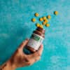 Floating capsules from the collection of vegan vitamins and supplements showcasing their natural design and quality