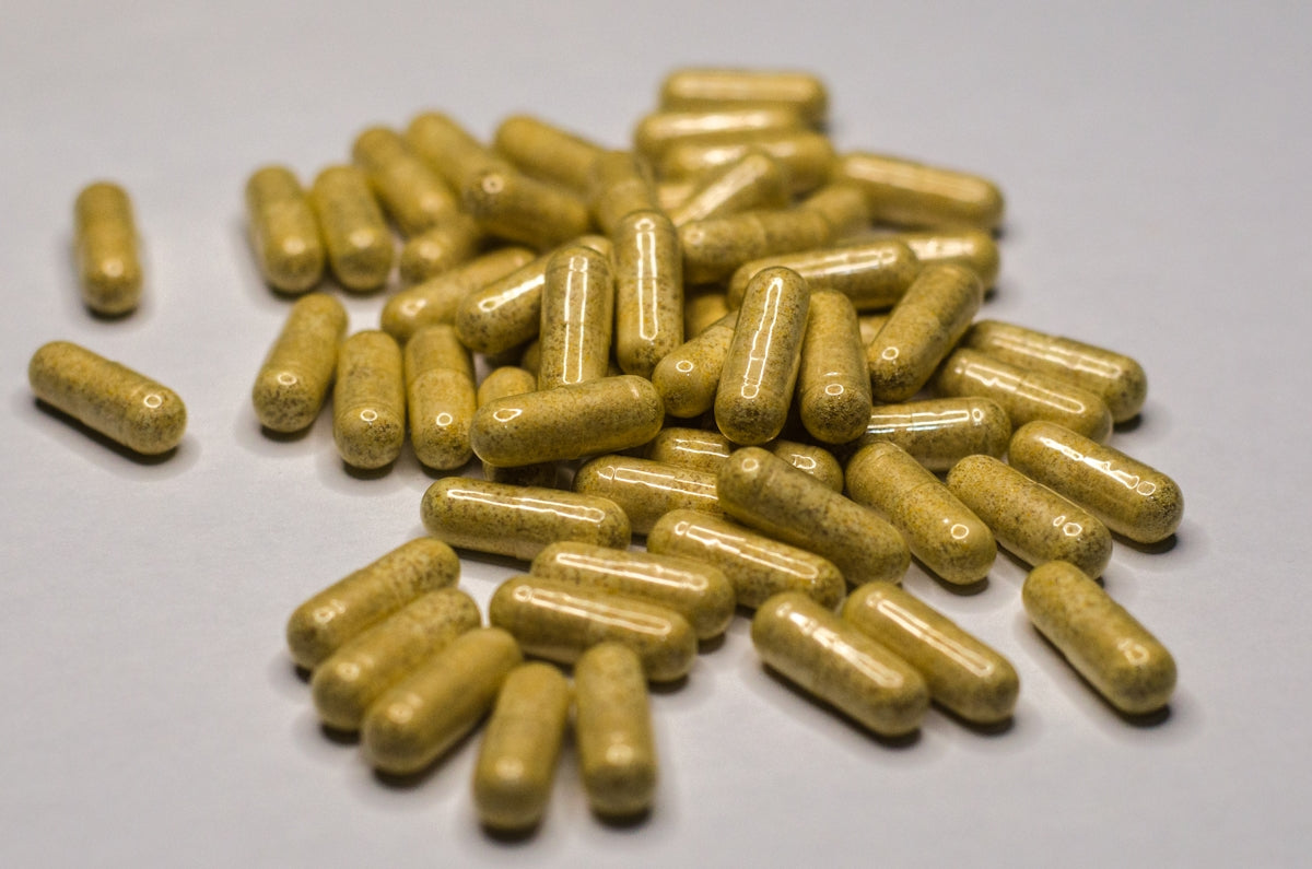 Floating capsules from the collection of vegan vitamins and supplements showcasing their natural design and quality