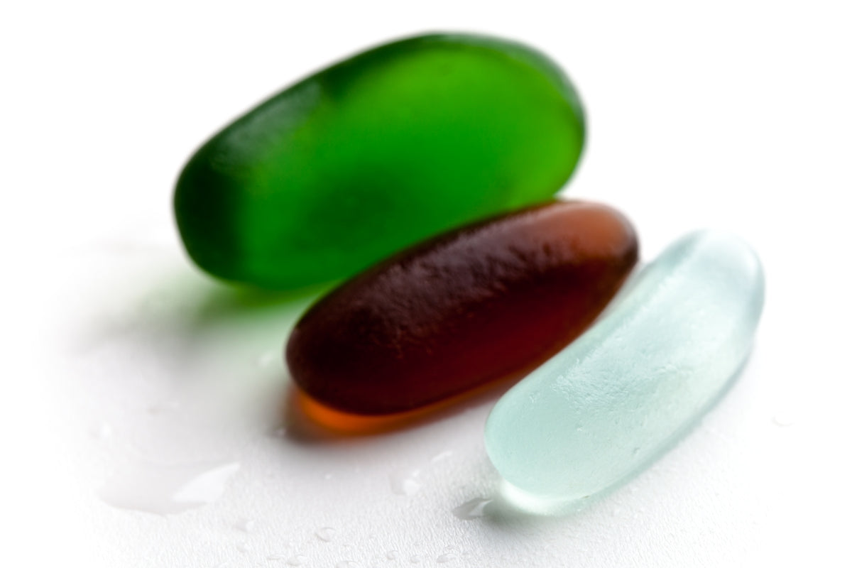 Floating capsules from the collection of vegan vitamins and supplements showcasing their natural design and quality
