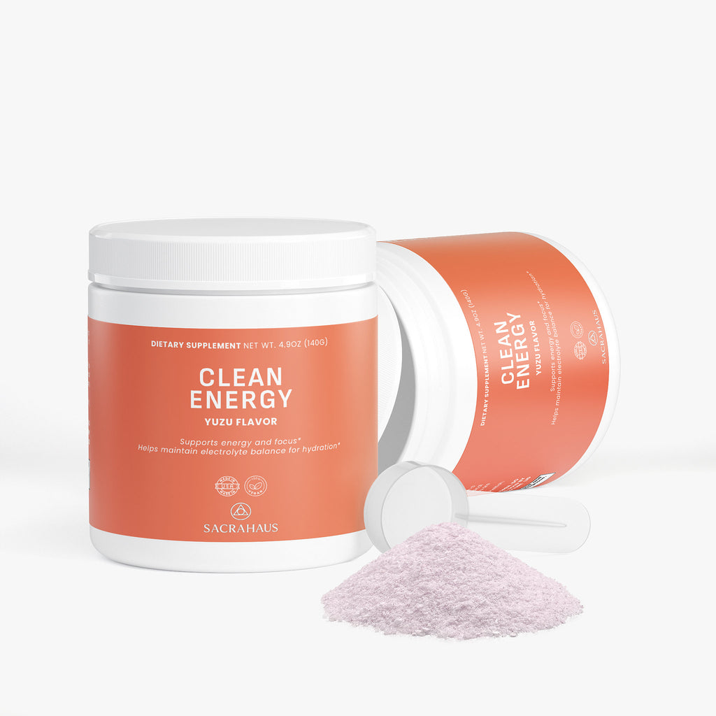 SACRAHAUS Clean Energy yuzu energy powder in pink container with scoop for pre-workout hydration