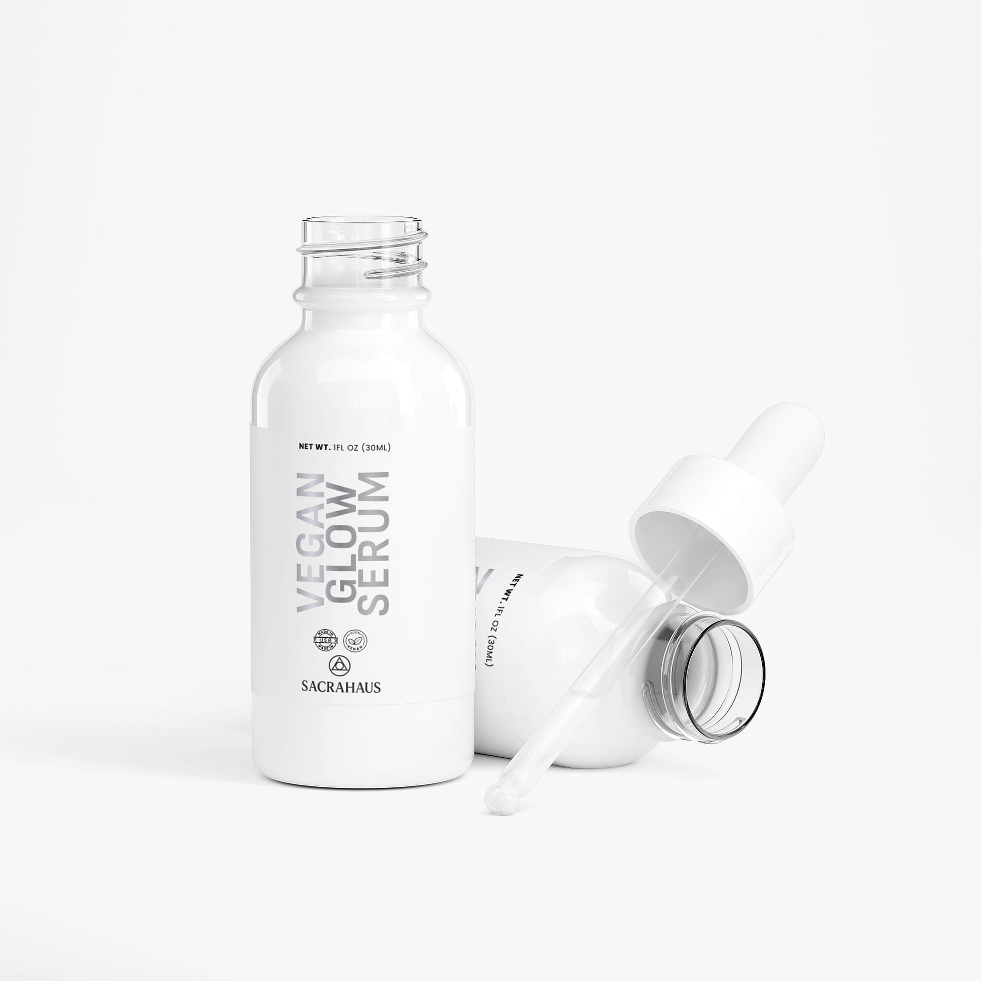 SACRAHAUS vegan glow serum in white bottle with dropper for radiant skin care
